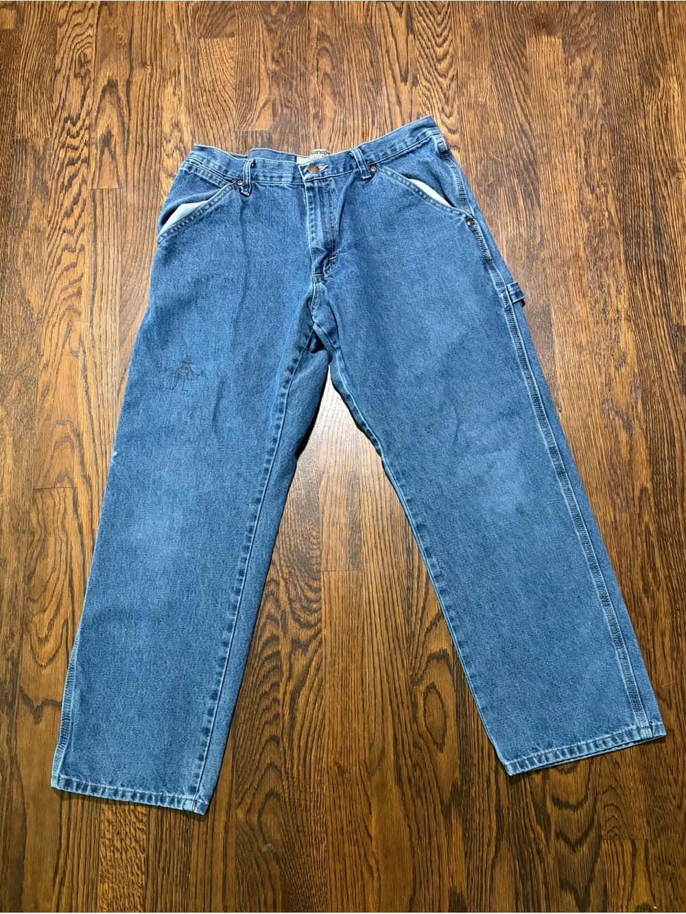 Wrangler carpenter jeans 32×29
medium blue denim with Artwork